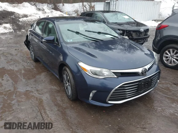✅ 2017 Toyota Avalon XLE • VIN: 4T1BK1EB5HU251664 • Lot: 44418958. Listed on IAAI with 94,970 mi. Free auction sales archive from the USA and detailed vehicle history report at DreamBid. Image 1.
