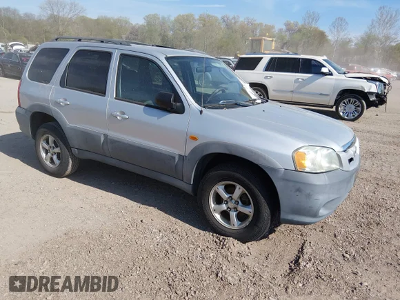 ✅ 2005 Mazda Tribute i • VIN: 4F2YZ02Z85KM01831 • Lot: 44882015. Listed on IAAI with 164,855 mi. Free auction sales archive from the USA and detailed vehicle history report at DreamBid. Image 1.