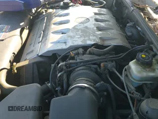 ✅ 2001 Cadillac DeVille • VIN: 1G6KD57Y81U209375 • Lot: 43263431. Listed on IAAI with 157,106 mi. Free auction sales archive from the USA and detailed vehicle history report at DreamBid. Image 12.