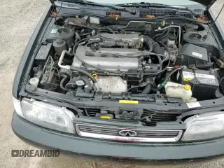 ✅ 1996 Infiniti G20 • VIN: JNKCP01D6TT541890 • Lot: 85539314. Wystawiony na Copart z przebiegiem 132 337 mil. Bezpłatny archiwum sprzedaży aukcyjnych z USA i szczegółowy raport historii pojazdu na DreamBid. Zdjęcie 13.