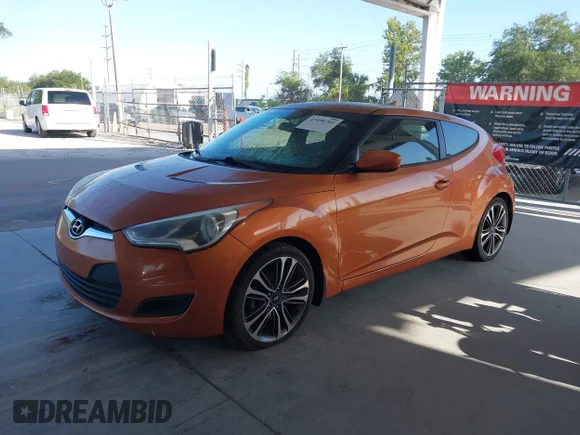 ✅ 2015 Hyundai Veloster • VIN: KMHTC6ADXFU241747 • Лот: 45490701. Опубликован ранее на IAAI с пробегом 162 913 миль. Бесплатный доступ к архиву аукционных продаж из США и подробный отчёт об истории автомобиля на DreamBid. Изображение 2.