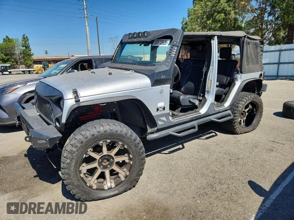 ✅ 2007 Jeep Wrangler Unlimited X • VIN: 1J4GA39167L161948 • Lot: 60670926. Wystawiony na Copart z przebiegiem Nie podano. Bezpłatny archiwum sprzedaży aukcyjnych z USA i szczegółowy raport historii pojazdu na DreamBid. Zdjęcie 1.