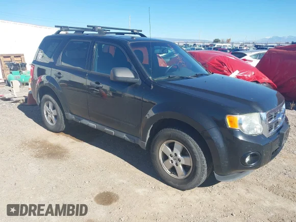 ✅ 2011 Ford Escape XLT • VIN: 1FMCU0D71BKB78222 • Lot: 43584760. Listed on IAAI with 189,590 mi. Free auction sales archive from the USA and detailed vehicle history report at DreamBid. Image 1.