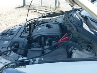 ✅ 2016 Mazda CX-5 Grand Touring • VIN: JM3KE2DY1G0671068 • Лот: 43181423. Опубликован ранее на IAAI с пробегом 172 382 миль. Бесплатный доступ к архиву аукционных продаж из США и подробный отчёт об истории автомобиля на DreamBid. Изображение 19.