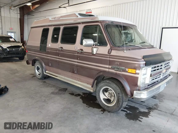 ✅ 1990 Chevrolet G20 • VIN: 2GBEG25K2L4127772 • Лот: 44065510. Опубліковано раніше на IAAI з пробігом 107 498 миль. Безкоштовний доступ до архіву аукціонних продажів зі США та докладний звіт про історію автомобіля на DreamBid. Зображення 1.