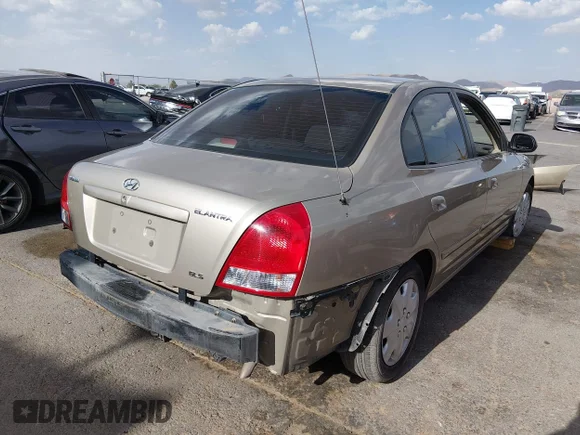 ✅ 2003 Hyundai Elantra GLS • VIN: KMHDN45D03U552614 • Lot: 45400954. Listed on IAAI with 60,204 mi. Free auction sales archive from the USA and detailed vehicle history report at DreamBid. Image 4.