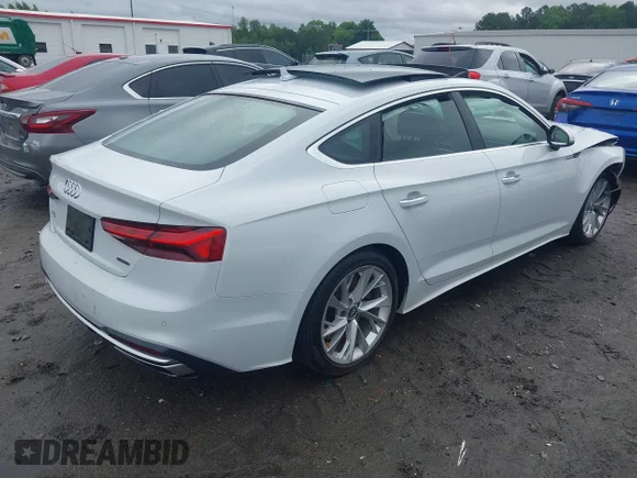 ✅ 2020 Audi A5 Sportback Premium Plus • VIN: WAUCNCF51LA003763 • Lot: 42252129. Wystawiony na IAAI z przebiegiem 80 087 mil. Bezpłatny archiwum sprzedaży aukcyjnych z USA i szczegółowy raport historii pojazdu na DreamBid. Zdjęcie 4.