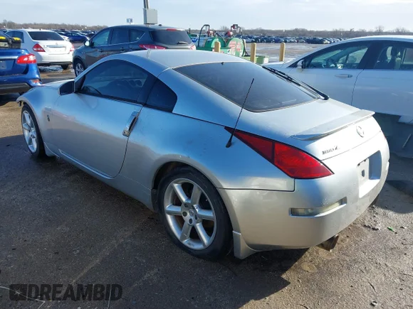 ✅ 2003 Nissan 350Z Enthusiast • VIN: JN1AZ34D53T118687 • Lot: 41694712. Wystawiony na IAAI z przebiegiem 158 339 mil. Bezpłatny archiwum sprzedaży aukcyjnych z USA i szczegółowy raport historii pojazdu na DreamBid. Zdjęcie 3.