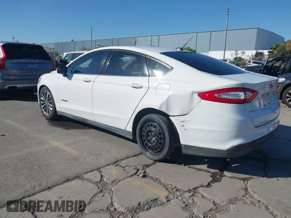 ✅ 2015 Ford Fusion S Hybrid • VIN: 3FA6P0UUXFR128568 • Лот: 45143469. Опубліковано раніше на IAAI з пробігом 198 791 миль. Безкоштовний доступ до архіву аукціонних продажів зі США та докладний звіт про історію автомобіля на DreamBid. Зображення 3.