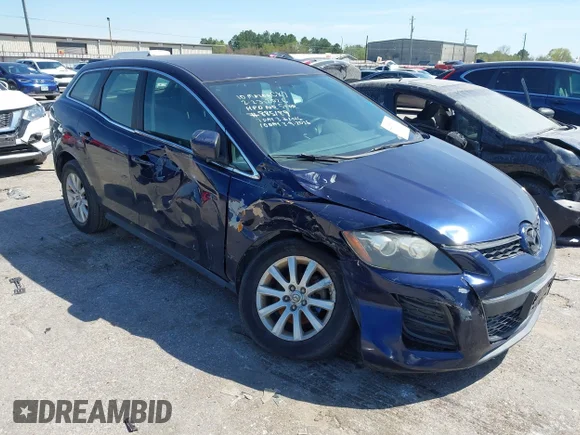 ✅ 2010 Mazda CX-7 SV • VIN: JM3ER2W50A0349064 • Lot: 44627669. Listed on IAAI with 142,594 mi. Free auction sales archive from the USA and detailed vehicle history report at DreamBid. Image 1.