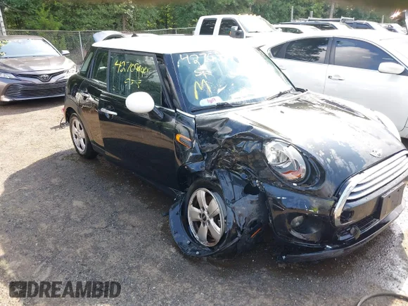 ✅ 2015 MINI Hardtop 4 Door • VIN: WMWXS5C53FT831770 • Лот: 42709944. Опубліковано раніше на IAAI з пробігом 205 435 миль. Безкоштовний доступ до архіву аукціонних продажів зі США та докладний звіт про історію автомобіля на DreamBid. Зображення 6.