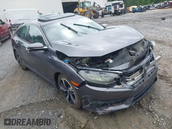 ✅ 2016 Honda Civic Touring • VIN: 19XFC1F96GE026908 • Lot: 44961382. Listed on IAAI with 75,628 mi. Free auction sales archive from the USA and detailed vehicle history report at DreamBid. Image 1.