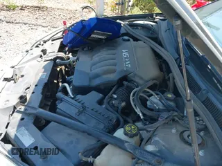 2013 Chevrolet Impala LS z VIN 2G1WF5E32D1242686, wystawiony jako IAAI lot #42901566 z przebiegiem 90 954 mil mil oraz . Historia ofert i sprzedaży dostępna na DreamBid. Obrazek 18.