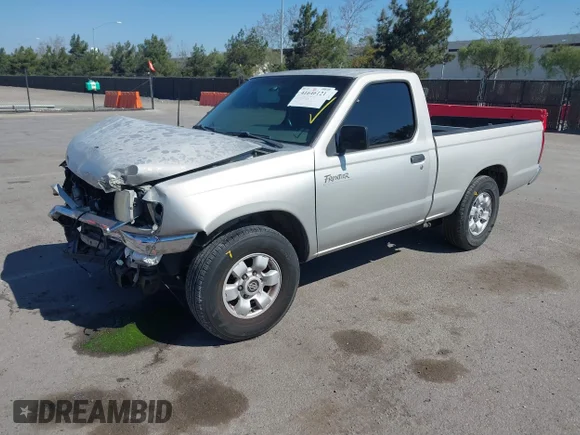 ✅ 1999 Nissan Frontier XE • VIN: 1N6DD21S4XC303399 • Lot: 41646121. Wystawiony na IAAI z przebiegiem 164 064 mil. Bezpłatny archiwum sprzedaży aukcyjnych z USA i szczegółowy raport historii pojazdu na DreamBid. Zdjęcie 2.