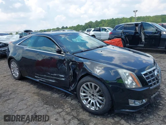 ✅ 2012 Cadillac CTS Premium • VIN: 1G6DP1E39C0107285 • Lot: 42570516. Listed on IAAI with 125,082 mi. Free auction sales archive from the USA and detailed vehicle history report at DreamBid. Image 1.