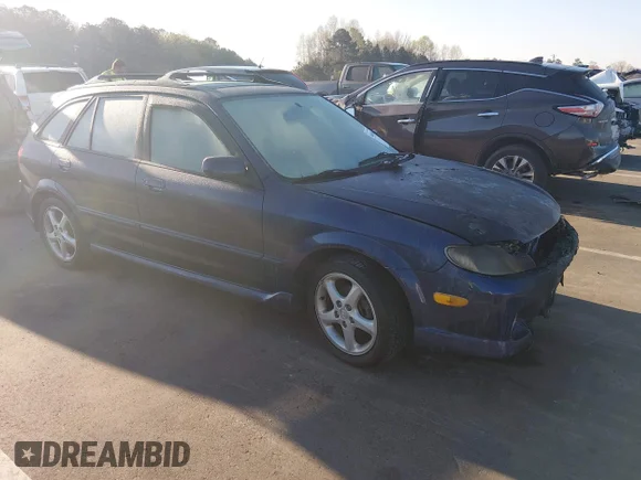 ✅ 2002 Mazda Protege • VIN: JM1BJ245621524600 • Lot: 44645984. Listed on IAAI with Not provided. Free auction sales archive from the USA and detailed vehicle history report at DreamBid. Image 1.