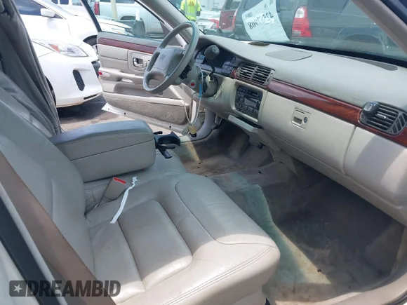 ✅ 1999 Cadillac DeVille • VIN: 1G6KD54Y8XU809438 • Lot: 42587908. Wystawiony na IAAI z przebiegiem 114 004 mil. Bezpłatny archiwum sprzedaży aukcyjnych z USA i szczegółowy raport historii pojazdu na DreamBid. Zdjęcie 5.