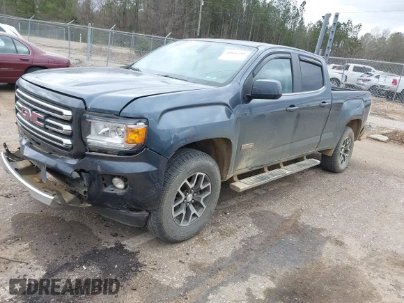 ✅ 2015 GMC Canyon 2WD SLE • VIN: 1GTG5BE36F1120094 • Лот: 41846184. Опубликован ранее на IAAI с пробегом 186 500 миль. Бесплатный доступ к архиву аукционных продаж из США и подробный отчёт об истории автомобиля на DreamBid. Изображение 2.