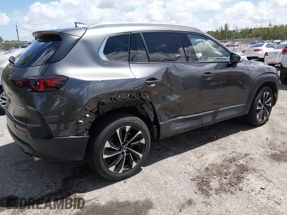 ✅ 2026 Mazda CX-50 Hybrid Premium Plus • VIN: 7MMVAAEWXTN144846 • Lot: 44750760. Wystawiony na IAAI z przebiegiem 4 550 mil. Bezpłatny archiwum sprzedaży aukcyjnych z USA i szczegółowy raport historii pojazdu na DreamBid. Zdjęcie 4.