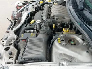 ✅ 1999 Chrysler Sebring JX • VIN: 3C3EL45HXXT604207 • Lot: 40870229. Listed on IAAI with 61,593 mi. Free auction sales archive from the USA and detailed vehicle history report at DreamBid. Image 20.