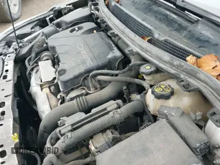 2018 Chevrolet Cruze Premier z VIN 3G1BF6SM8JS564749, wystawiony jako IAAI lot #43270687 z przebiegiem 175 318 mil mil oraz . Historia ofert i sprzedaży dostępna na DreamBid. Obrazek 19.