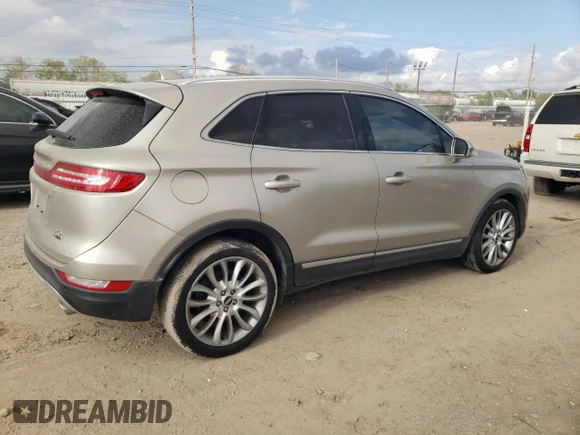 ✅ 2015 Lincoln MKC • VIN: 5LMCJ1A92FUJ25492 • Lot: 79845024. Wystawiony na Copart z przebiegiem 104 945 mil. Bezpłatny archiwum sprzedaży aukcyjnych z USA i szczegółowy raport historii pojazdu na DreamBid. Zdjęcie 3.