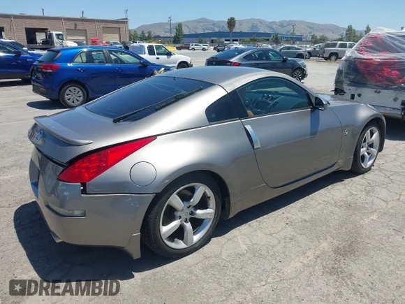 ✅ 2007 Nissan 350Z Nismo • VIN: JN1BZ34E27M551056 • Lot: 45150891. Wystawiony na IAAI z przebiegiem 185 412 mil. Bezpłatny archiwum sprzedaży aukcyjnych z USA i szczegółowy raport historii pojazdu na DreamBid. Zdjęcie 4.