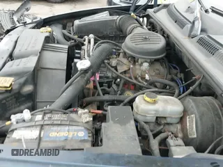 2002 Dodge Dakota Sport z VIN 1B7GL32X12S561414, wystawiony jako IAAI lot #42060300 z przebiegiem 235 957 mil mil oraz . Historia ofert i sprzedaży dostępna na DreamBid. Obrazek 19.