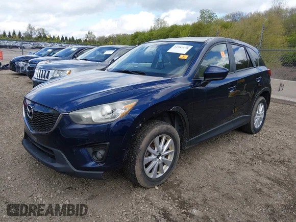 ✅ 2014 Mazda CX-5 Touring • VIN: JM3KE4CY3E0303419 • Lot: 44987178. Wystawiony na IAAI z przebiegiem Nie podano. Bezpłatny archiwum sprzedaży aukcyjnych z USA i szczegółowy raport historii pojazdu na DreamBid. Zdjęcie 2.