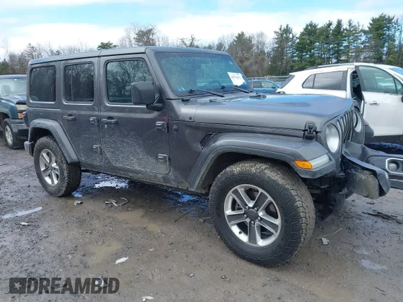 ✅ 2020 Jeep Wrangler Unlimited Sahara • VIN: 1C4HJXEN0LW125594 • Lot: 44779472. Listed on IAAI with 153,179 mi. Free auction sales archive from the USA and detailed vehicle history report at DreamBid. Image 1.