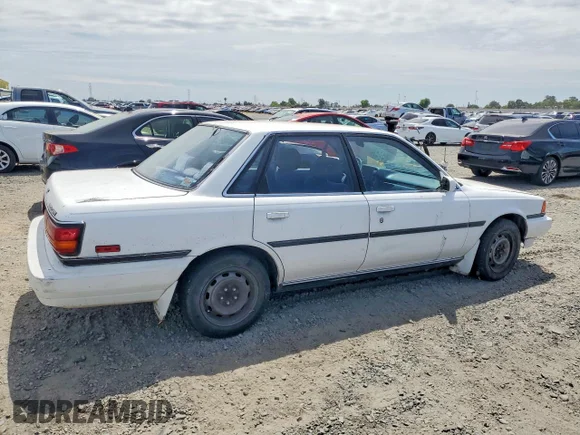✅ 1990 Toyota Camry LE • VIN: JT2SV22E5L0345116 • Lot: 55320426. Wystawiony na Copart z przebiegiem 241 103 mil. Bezpłatny archiwum sprzedaży aukcyjnych z USA i szczegółowy raport historii pojazdu na DreamBid. Zdjęcie 3.