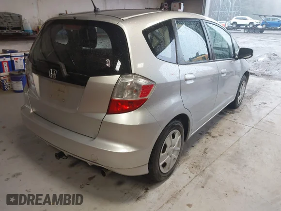 ✅ 2013 Honda Fit • VIN: JHMGE8H30DC045617 • Lot: 44424487. Listed on IAAI with 105,655 mi. Free auction sales archive from the USA and detailed vehicle history report at DreamBid. Image 4.