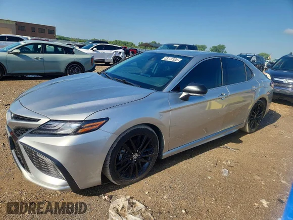 ✅ 2022 Toyota Camry Hybrid XSE • VIN: 4T1K31AK3NU584296 • Лот: 55172106. Опубликован ранее на Copart с пробегом 99 084 миль. Бесплатный доступ к архиву аукционных продаж из США и подробный отчёт об истории автомобиля на DreamBid. Изображение 1.