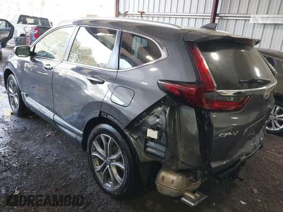✅ 2021 Honda CR-V Touring • VIN: 2HKRW2H96MH645894 • Lot: 44293514. Wystawiony na IAAI z przebiegiem 104 940 mil. Bezpłatny archiwum sprzedaży aukcyjnych z USA i szczegółowy raport historii pojazdu na DreamBid. Zdjęcie 3.