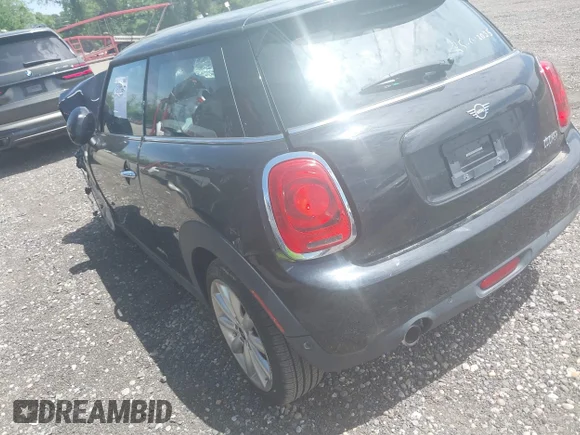 ✅ 2021 MINI Hardtop Cooper • VIN: WMWXR3C07M2N13593 • Lot: 45193657. Listed on IAAI with 25,480 mi. Free auction sales archive from the USA and detailed vehicle history report at DreamBid. Image 3.