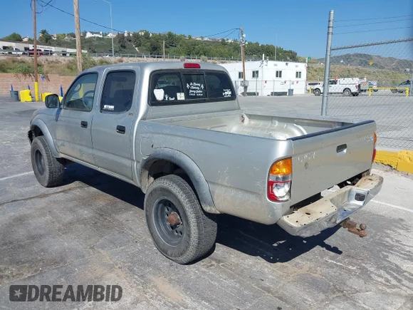✅ 2002 Toyota Tacoma PreRunner • VIN: 5TEGN92N52Z077981 • Lot: 44693551. Wystawiony na IAAI z przebiegiem 285 138 mil. Bezpłatny archiwum sprzedaży aukcyjnych z USA i szczegółowy raport historii pojazdu na DreamBid. Zdjęcie 3.