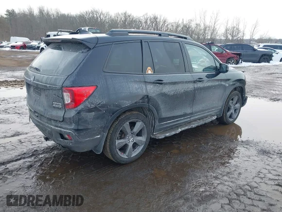 ✅ 2021 Honda Passport Touring • VIN: 5FNYF8H96MB010784 • Lot: 44338548. Wystawiony na IAAI z przebiegiem 65 394 mil. Bezpłatny archiwum sprzedaży aukcyjnych z USA i szczegółowy raport historii pojazdu na DreamBid. Zdjęcie 4.
