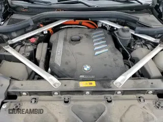 ✅ 2022 BMW X5 xDrive45e • VIN: 5UXTA6C02N9L31477 • Lot: 91510295. Wystawiony na Copart z przebiegiem 59 497 mil. Bezpłatny archiwum sprzedaży aukcyjnych z USA i szczegółowy raport historii pojazdu na DreamBid. Zdjęcie 14.