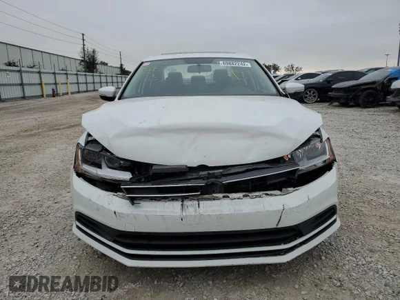 ✅ 2017 Volkswagen Jetta SE • VIN: 3VWDB7AJ5HM257060 • Лот: 69882242. Опубліковано раніше на Copart з пробігом 98 335 миль. Безкоштовний доступ до архіву аукціонних продажів зі США та докладний звіт про історію автомобіля на DreamBid. Зображення 5.