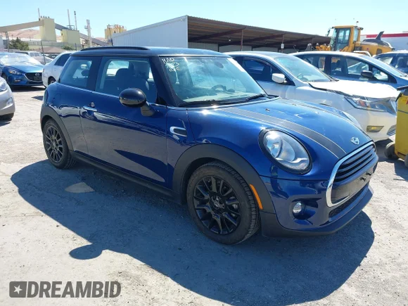 ✅ 2018 MINI Hardtop Cooper • VIN: WMWXP5C57J2G61769 • Lot: 42812369. Listed on IAAI with 20,033 mi. Free auction sales archive from the USA and detailed vehicle history report at DreamBid. Image 1.