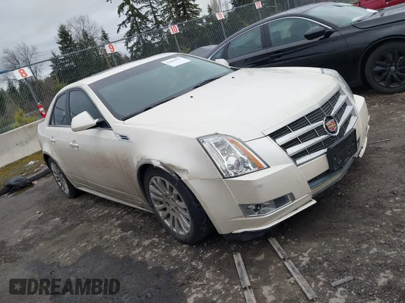 ✅ 2010 Cadillac CTS Premium • VIN: 1G6DS5EV3A0129450 • Лот: 41602955. Опубликован ранее на IAAI с пробегом 106 725 миль. Бесплатный доступ к архиву аукционных продаж из США и подробный отчёт об истории автомобиля на DreamBid. Изображение 1.