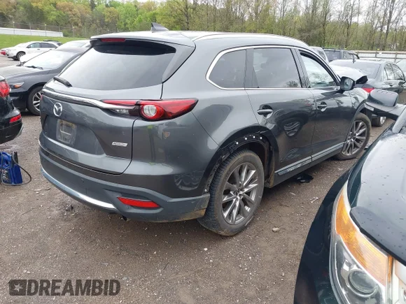 ✅ 2017 Mazda CX-9 Grand Touring • VIN: JM3TCBDY4H0132746 • Лот: 41967205. Опубліковано раніше на IAAI з пробігом 112 338 миль. Безкоштовний доступ до архіву аукціонних продажів зі США та докладний звіт про історію автомобіля на DreamBid. Зображення 4.