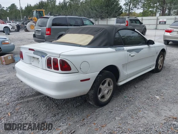 ✅ 1996 Ford Mustang • VIN: 1FALP444XTF120909 • Лот: 44422523. Опубліковано раніше на IAAI з пробігом 104 101 миль. Безкоштовний доступ до архіву аукціонних продажів зі США та докладний звіт про історію автомобіля на DreamBid. Зображення 4.