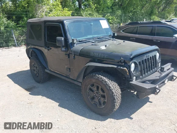 ✅ 2014 Jeep Wrangler Sport • VIN: 1C4AJWAGXEL253249 • Lot: 45077909. Listed on IAAI with 105,899 mi. Free auction sales archive from the USA and detailed vehicle history report at DreamBid. Image 1.