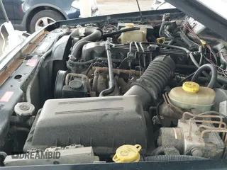 ✅ 1998 Jeep Cherokee Sport • VIN: 1J4FJ68S8WL221881 • Lot: 42850115. Listed on IAAI with 236,606 mi. Free auction sales archive from the USA and detailed vehicle history report at DreamBid. Image 12.