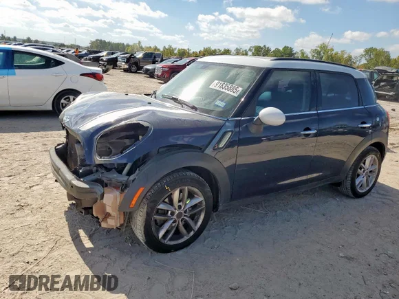 ✅ 2014 MINI Countryman S • VIN: WMWZC3C54EWP26887 • Lot: 91835885. Listed on Copart with 87,460 mi. Free auction sales archive from the USA and detailed vehicle history report at DreamBid. Image 1.