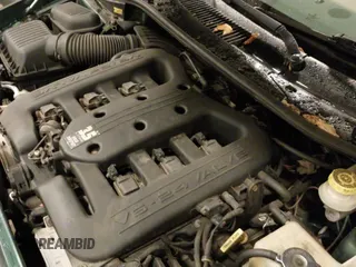 ✅ 1999 Chrysler LHS • VIN: 2C3HC56G3XH236910 • Lot: 43785208. Listed on IAAI with 68,584 mi. Free auction sales archive from the USA and detailed vehicle history report at DreamBid. Image 12.