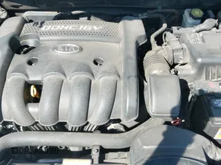 ✅ 2007 Kia Optima LX • VIN: KNAGE123575127737 • Lot: 42946792. Listed on IAAI with 144,185 mi. Free auction sales archive from the USA and detailed vehicle history report at DreamBid. Image 12.