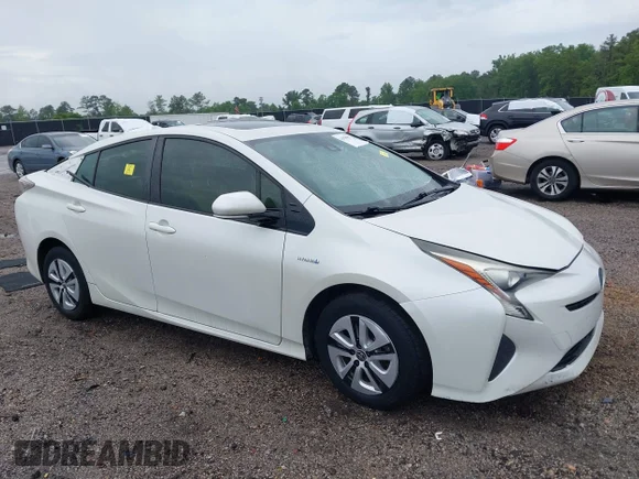 ✅ 2016 Toyota Prius Two Eco • VIN: JTDKARFU8G3524834 • Lot: 44990852. Listed on IAAI with 130,179 mi. Free auction sales archive from the USA and detailed vehicle history report at DreamBid. Image 1.