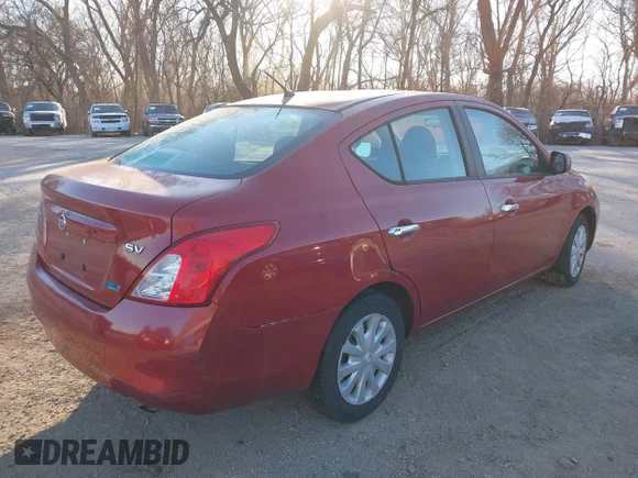 ✅ 2012 Nissan Versa S • VIN: 3N1CN7AP3CL816360 • Lot: 44216243. Listed on IAAI with 119,594 mi. Free auction sales archive from the USA and detailed vehicle history report at DreamBid. Image 4.